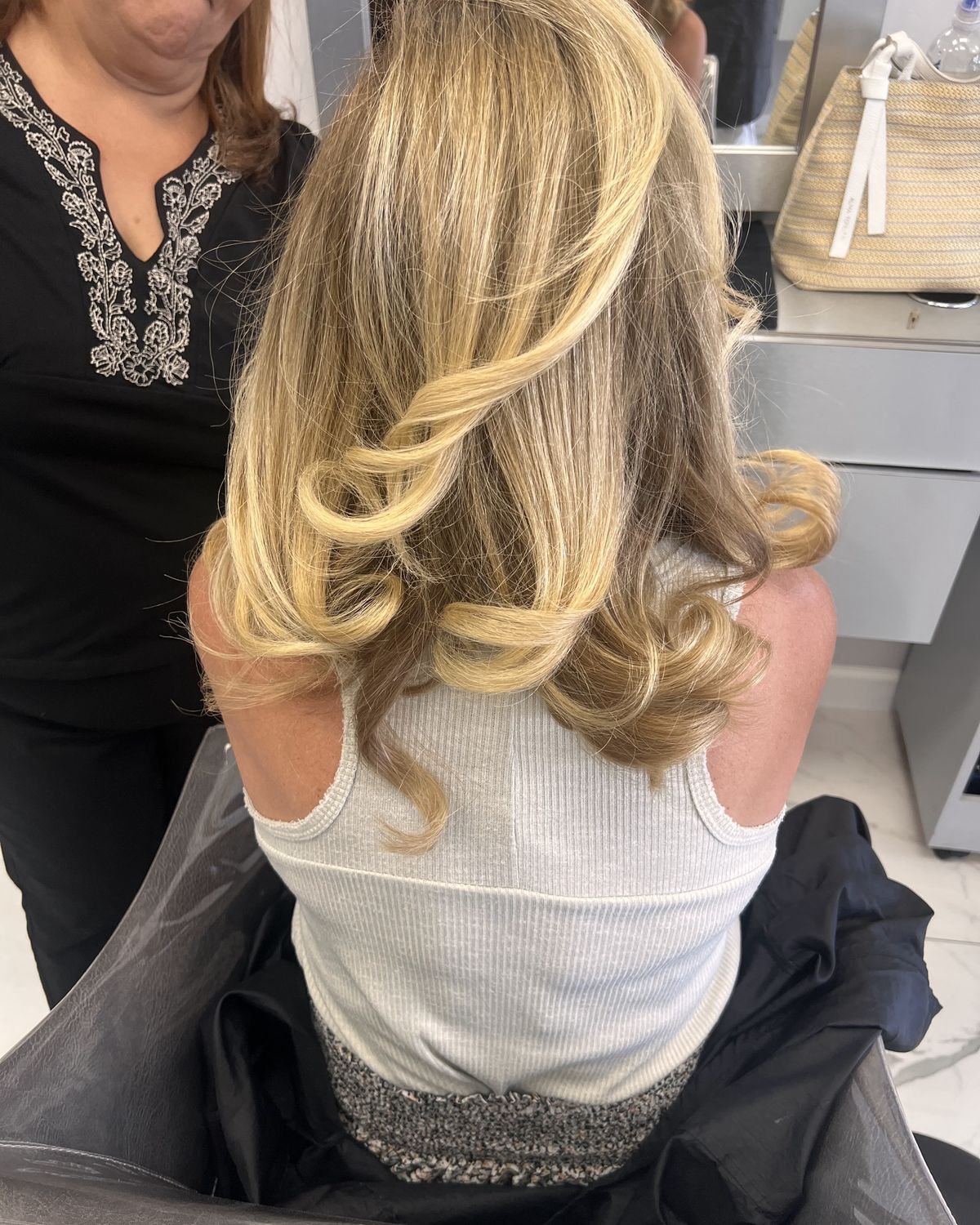 Blonde set into a soft finish for an evening out — Toucheé Organic Salon, Juno Beach