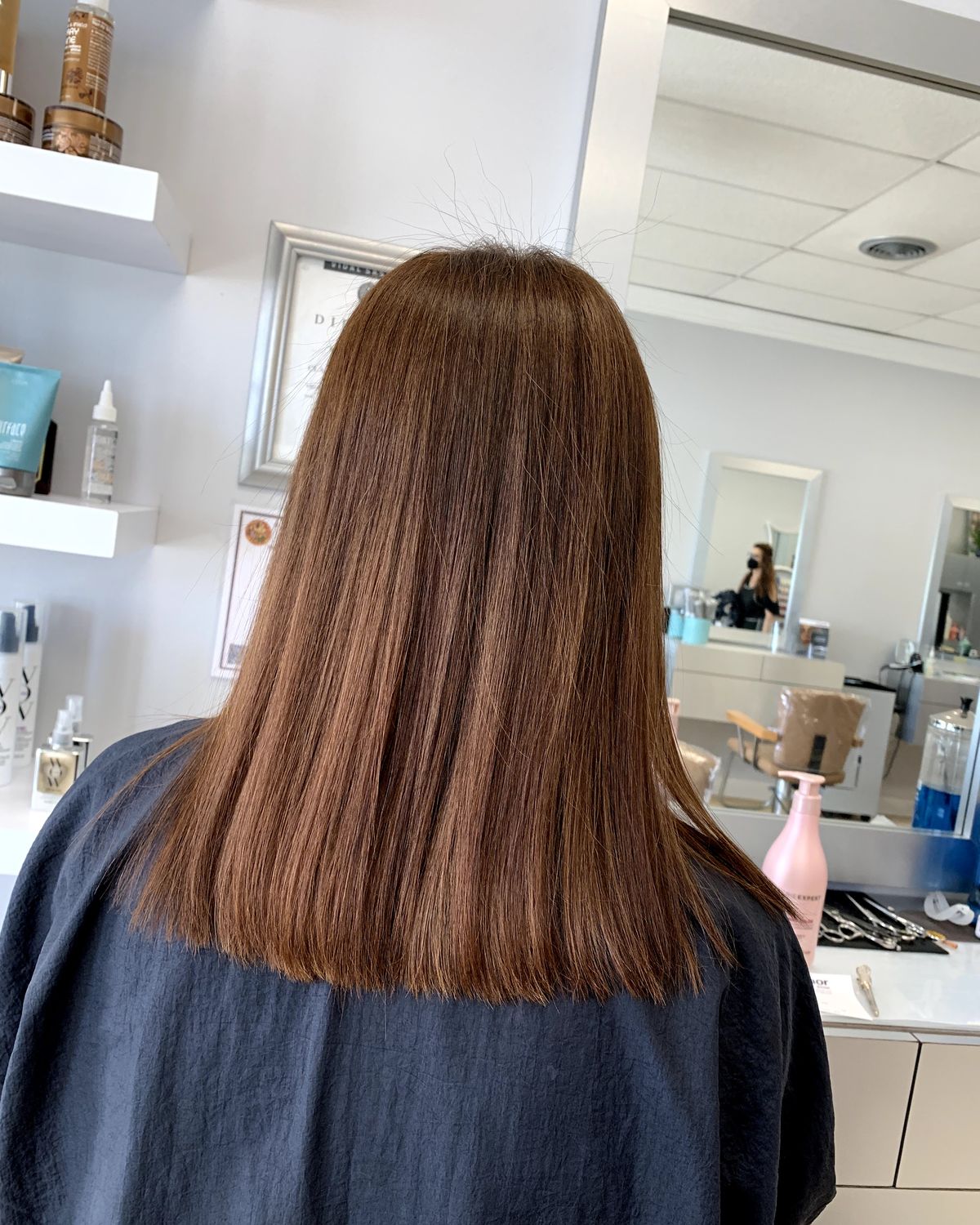 Rich copper red worn long — Toucheé Organic Salon, Juno Beach
